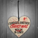 Survived Christmas With In-Laws Novelty Wooden Heart Plaque