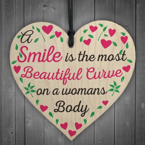 Smile Is The Most Beautiful Curve Wooden Hanging Heart Plaque