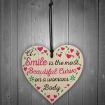 Smile Is The Most Beautiful Curve Wooden Hanging Heart Plaque