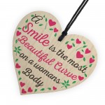 Smile Is The Most Beautiful Curve Wooden Hanging Heart Plaque