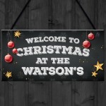 Christmas at the 'Surname' plaque. Personalised Hanging Sign