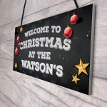 Christmas at the 'Surname' plaque. Personalised Hanging Sign