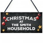 Christmas At The Any Name Household Personalised Christmas Sign