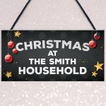 Christmas At The Any Name Household Personalised Christmas Sign