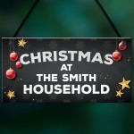 Christmas At The Any Name Household Personalised Christmas Sign