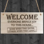 Everyone Brings Joy To This House Wooden Hanging Plaque