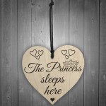 The Princess Sleeps Here Wooden Hanging Heart Bedroom Plaque